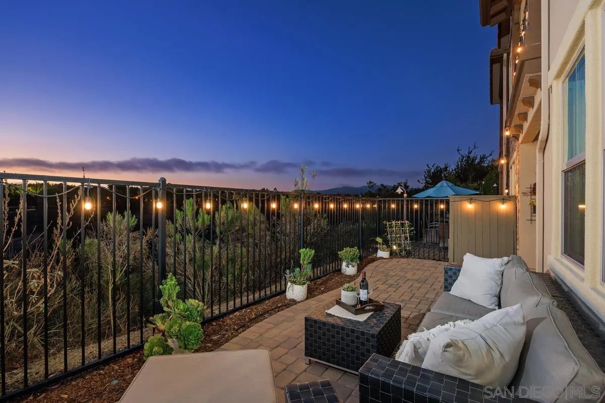 8458 Christopher Ridge Terrace San Diego, CA 92127 - Photo 27 of 41 a view of a balcony with couches and potted plants