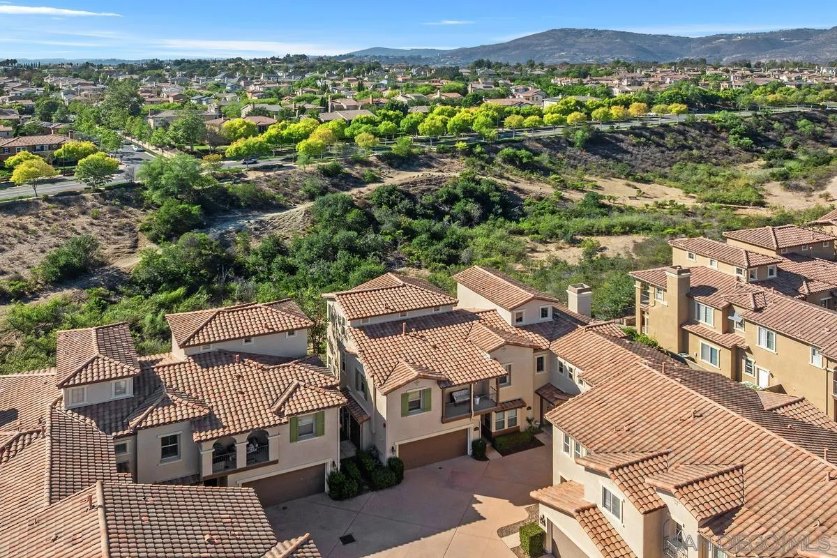 8458 Christopher Ridge Terrace San Diego, CA 92127 - Photo 31 of 41 an aerial view of a houses with a city view