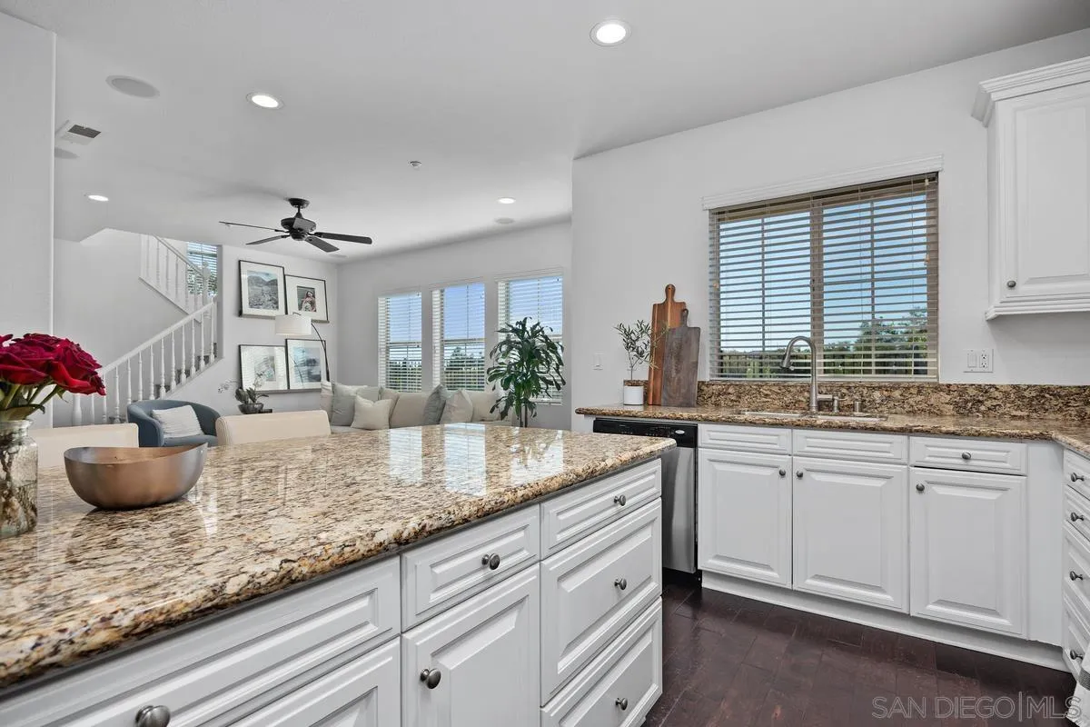 8458 Christopher Ridge Terrace San Diego, CA 92127 - Photo 5 of 41 a kitchen with sink and cabinets