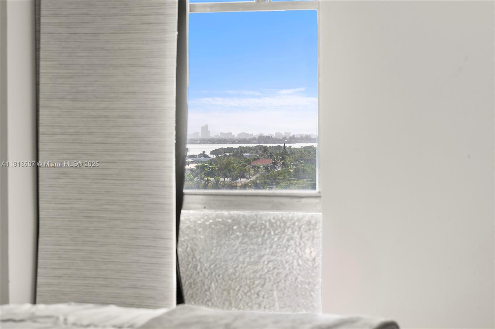 2350 Northeast 135th Street, Unit 1006 North Miami, FL 33181 - Photo 15 of 29 a view of a glass door