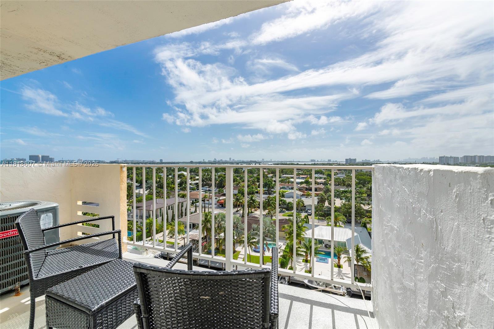 2350 Northeast 135th Street, Unit 1006 North Miami, FL 33181 - Photo 20 of 29 view of balcony with couch