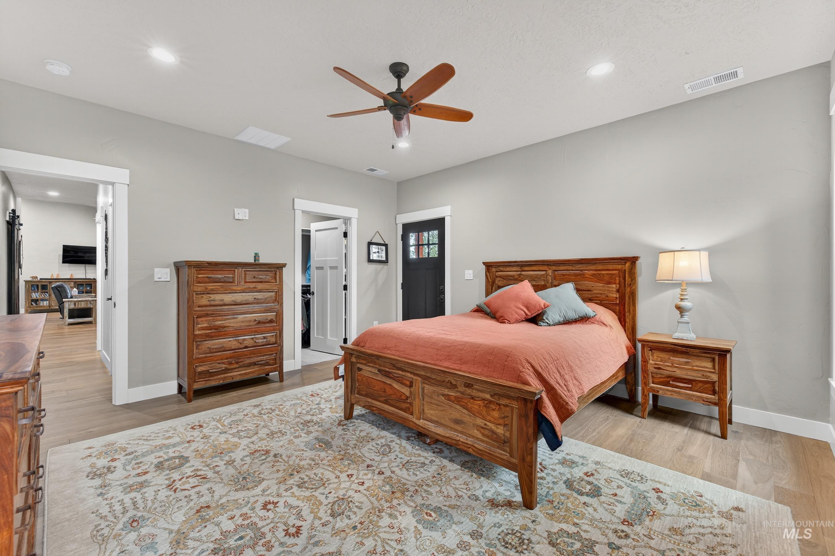 10191 Timberrim Drive Cascade, ID 83611 - Photo 25 of 44 Bedroom featuring a ceiling fan, recessed lighting, and light wood-type flooring