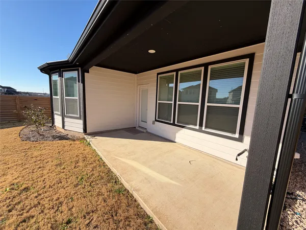 a house view with a outdoor space