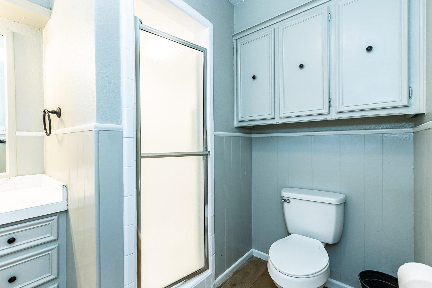 3411 42nd Street Lubbock, TX 79413 - Photo 14 of 33 a bathroom with a toilet