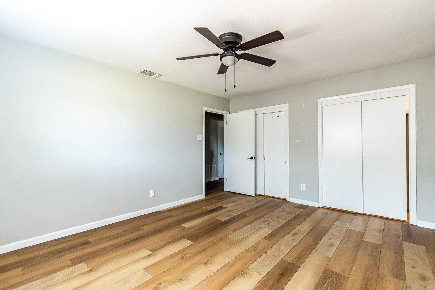 3411 42nd Street Lubbock, TX 79413 - Photo 20 of 33 a view of a big room with wooden floor
