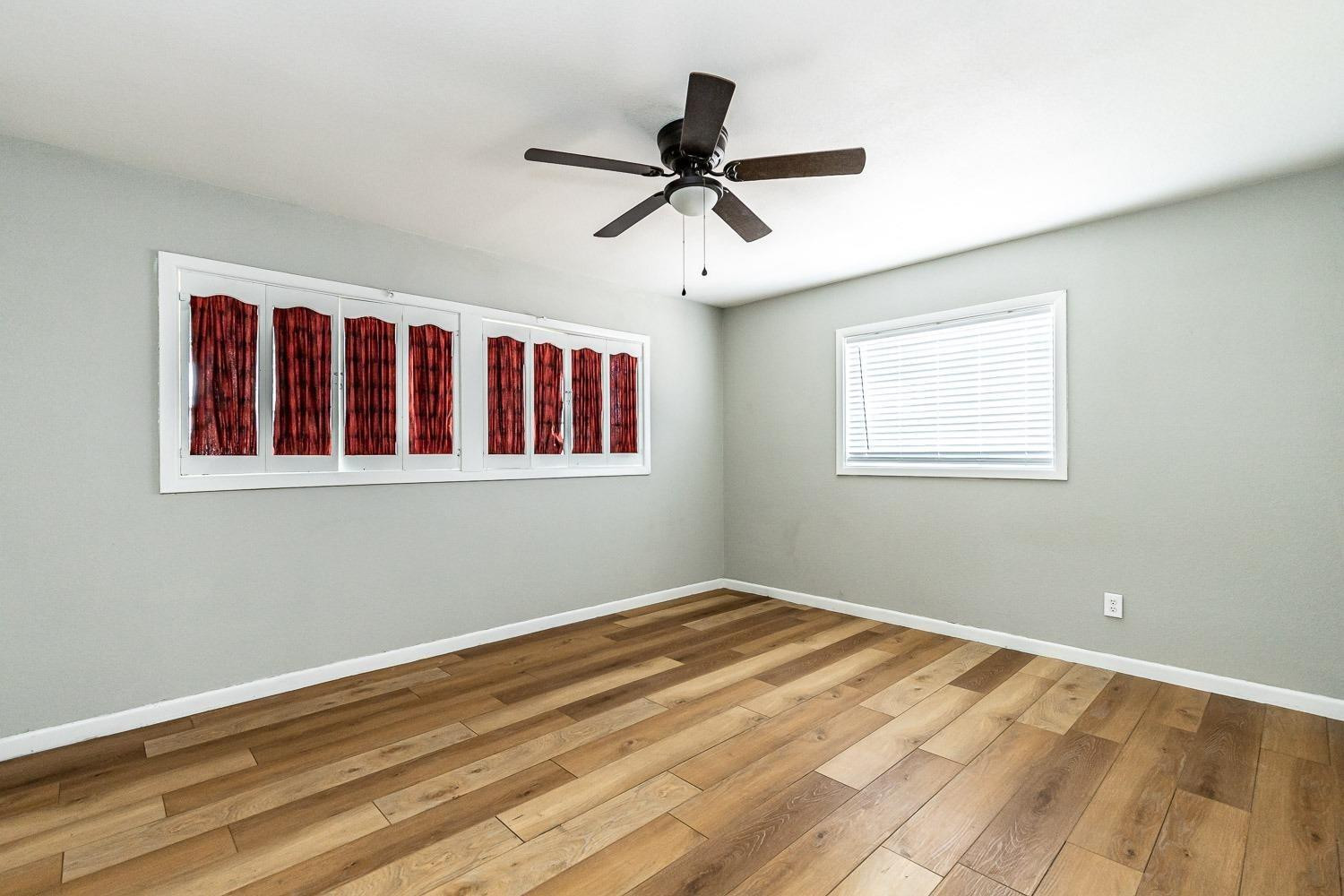 3411 42nd Street Lubbock, TX 79413 - Photo 21 of 33 a view of empty room with wooden floor