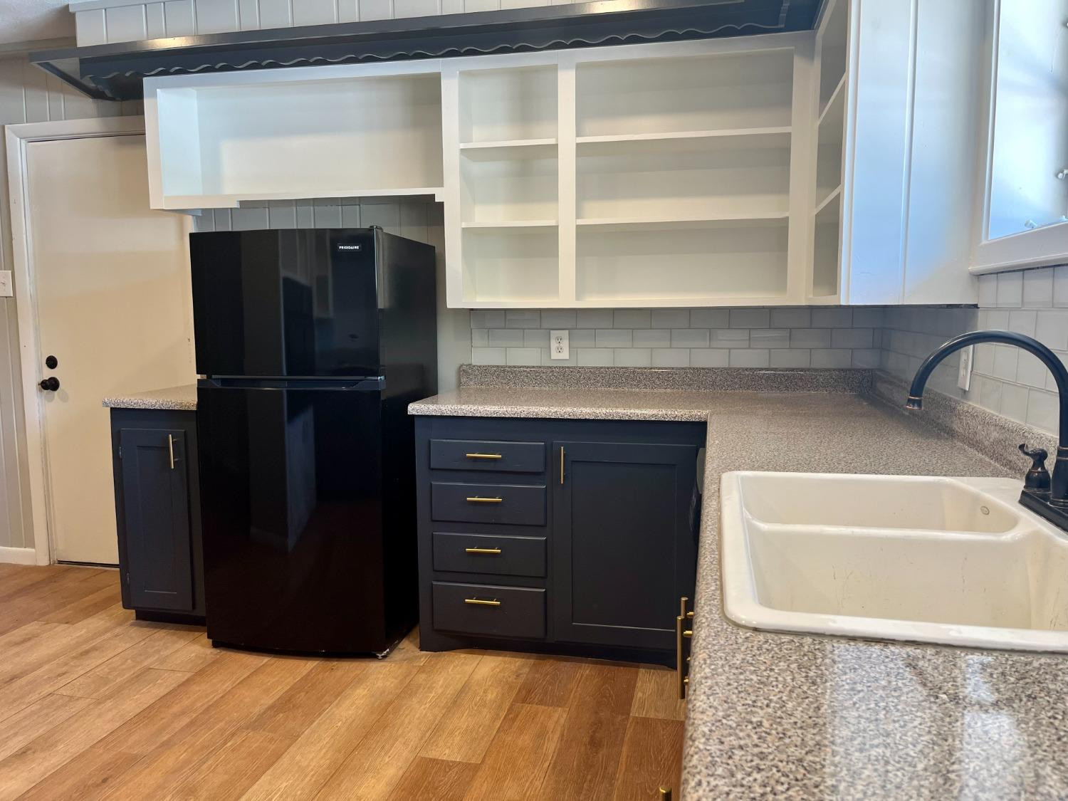 3411 42nd Street Lubbock, TX 79413 - Photo 6 of 33 a room with a dresser and a mirror