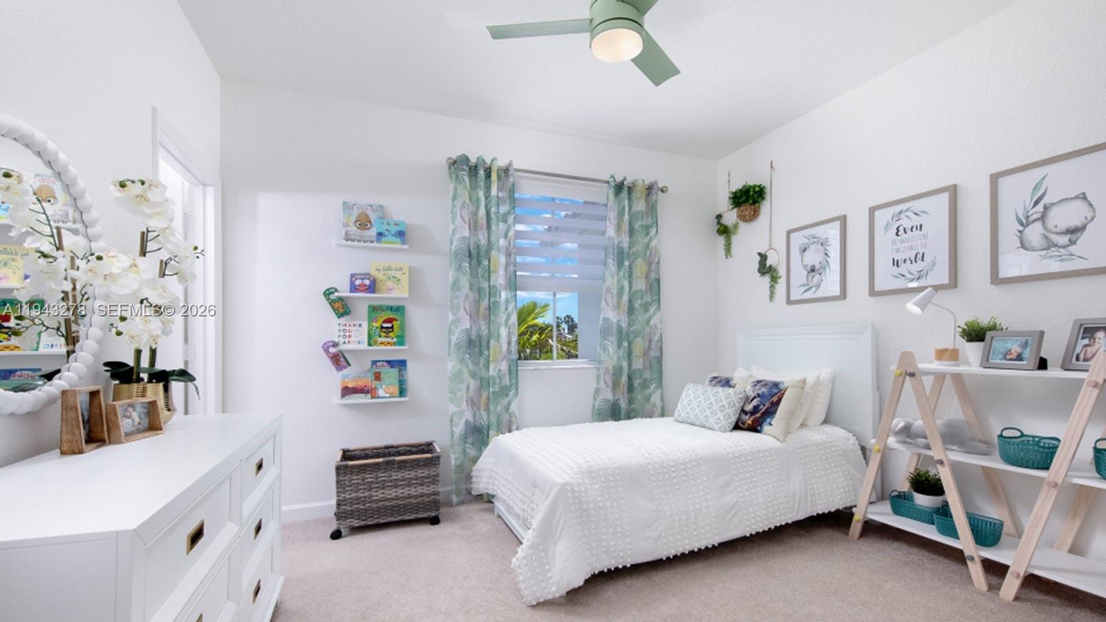 2663 Southeast 27th Street Homestead, FL 33035 - Photo 8 of 8 a bedroom with a bed and a desk