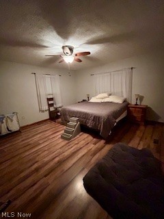 1465 Derby Road Waterford, OH 45786 - Photo 12 of 20 Bedroom with wood-type flooring and ceiling fan