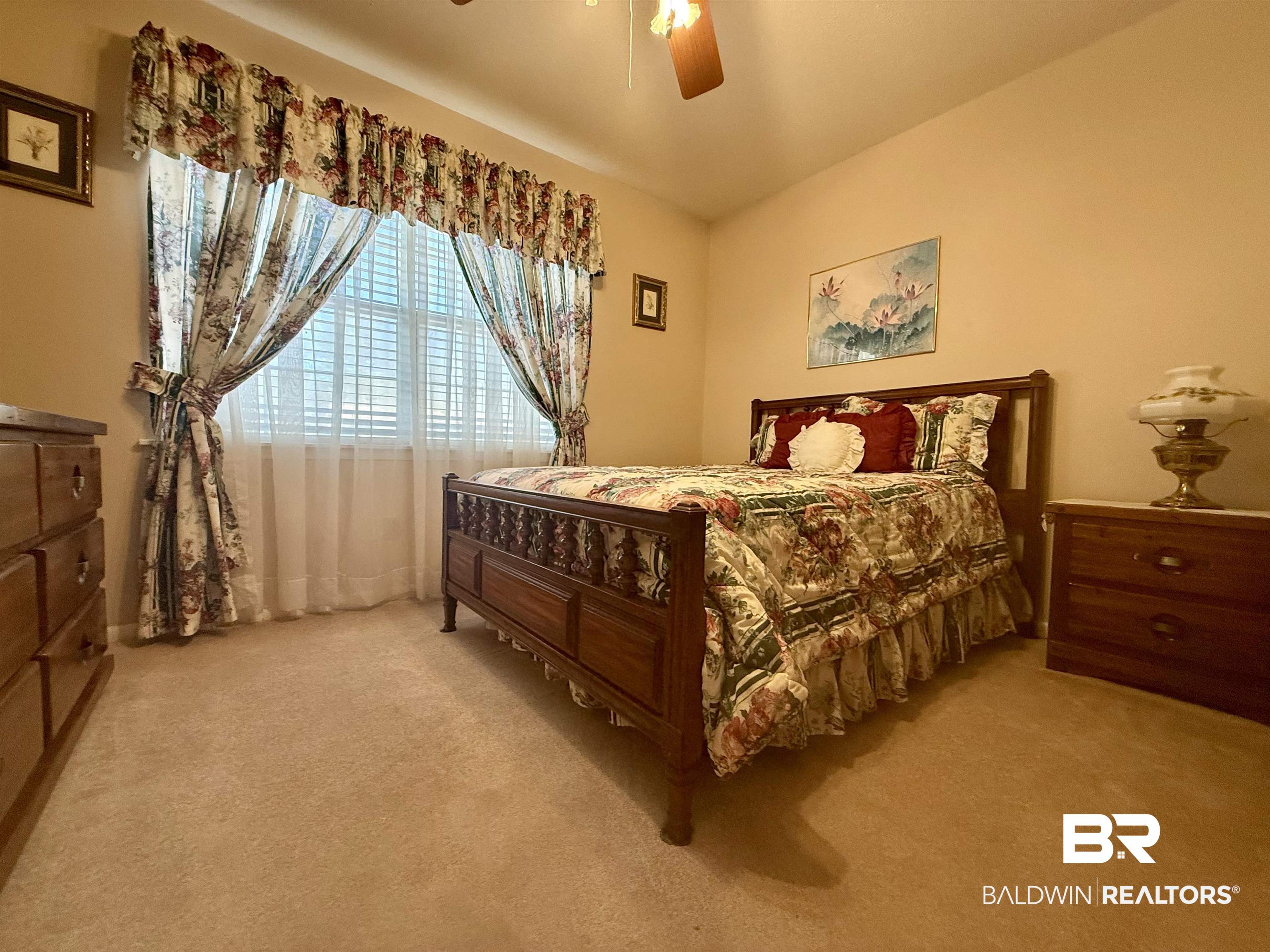 215 Young Street Brewton, AL 36426 - Photo 12 of 25 Carpeted bedroom featuring ceiling fan