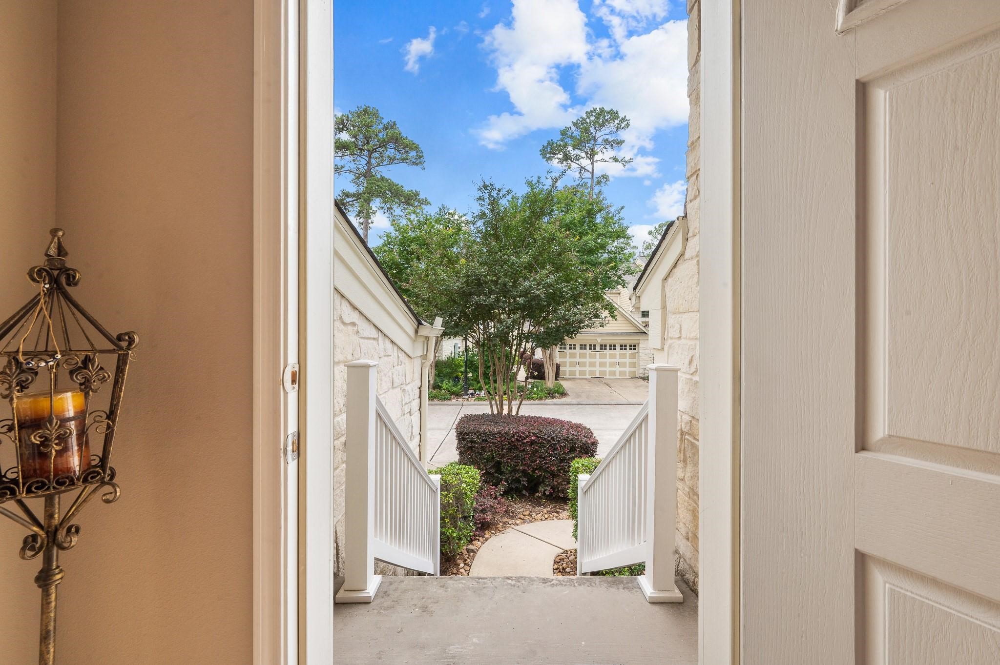13600 Breton Ridge Street, Unit 25E Houston, TX 77070 - Photo 5 of 39 a potted plant sitting in front of a door