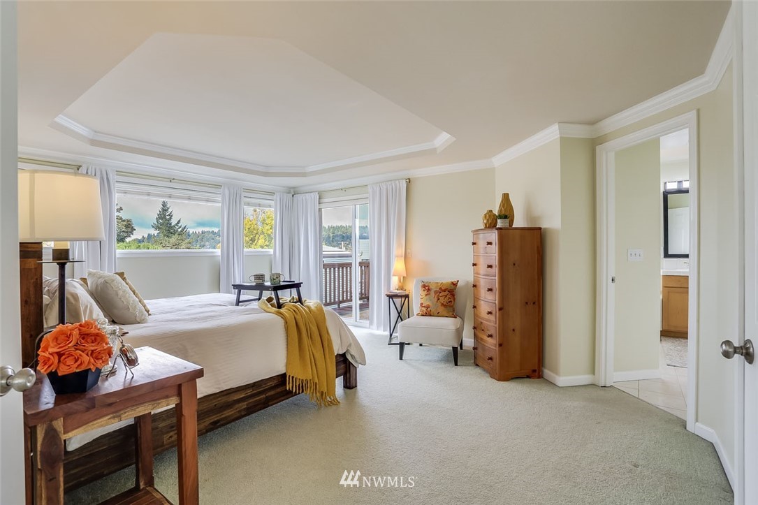 906 North 33rd Street Renton, WA 98056 - Photo 22 of 40 a bed room with a bed and window