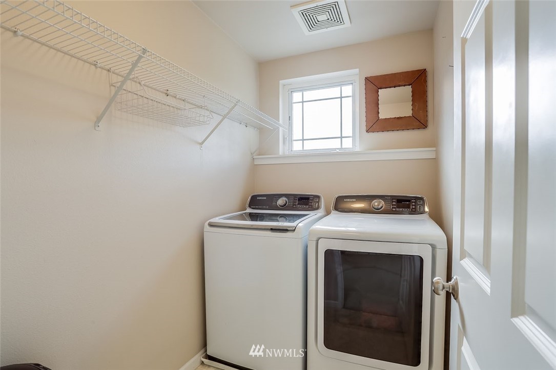 906 North 33rd Street Renton, WA 98056 - Photo 33 of 40 a utility room with dryer and washer