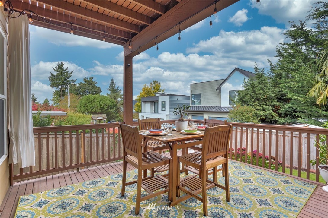906 North 33rd Street Renton, WA 98056 - Photo 34 of 40 a view of a patio with a table and chairs