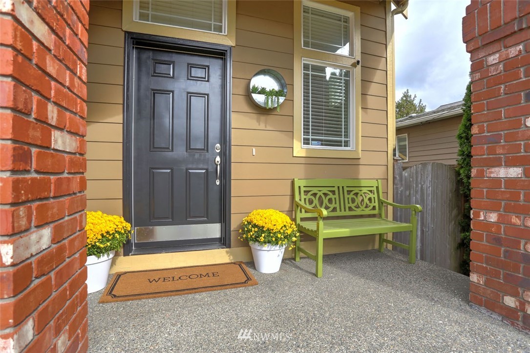 906 North 33rd Street Renton, WA 98056 - Photo 6 of 40 a building outdoor space with a bench and couch