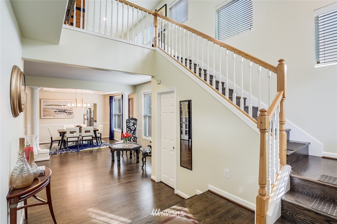 906 North 33rd Street Renton, WA 98056 - Photo 7 of 40 a view of entryway and hall with wooden floor