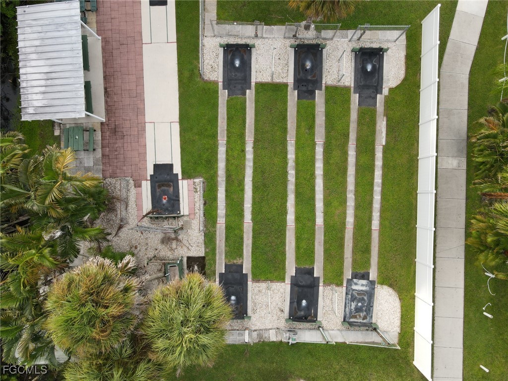 19681 Summerlin Road, Unit 87 Fort Myers, FL 33908 - Photo 12 of 15 a view of a back yard from a patio