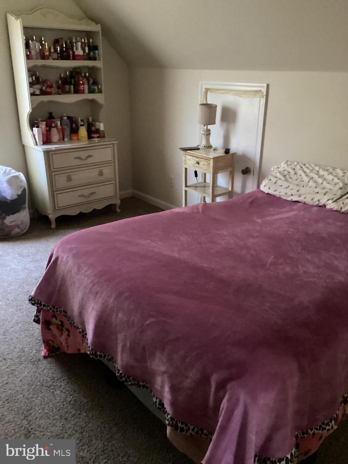 7612 Marye Road Spotsylvania, VA 22551 - Photo 11 of 39 a bedroom with a bed and a window