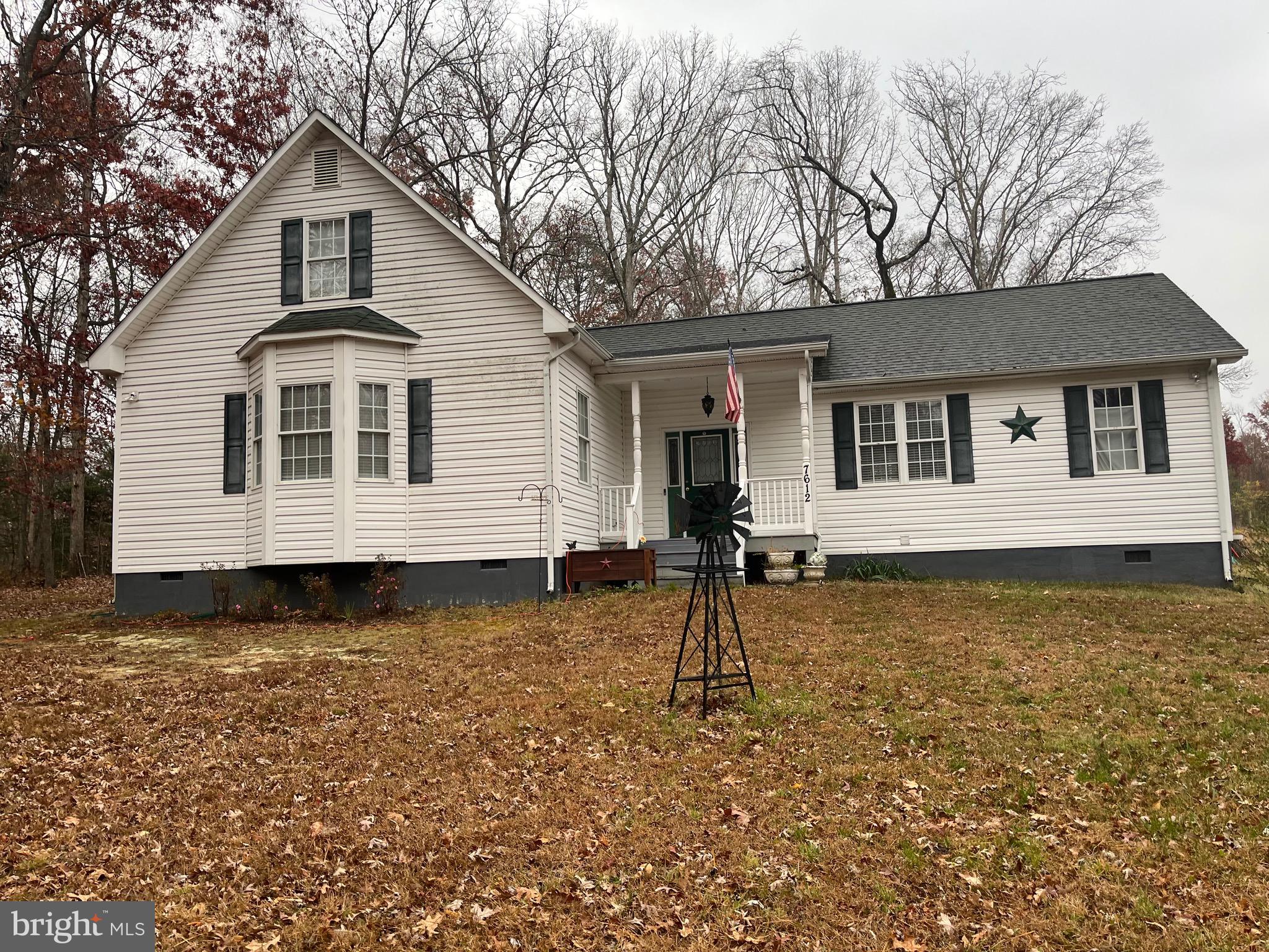7612 Marye Road Spotsylvania, VA 22551 - Photo 13 of 39 a front view of a house with a yard