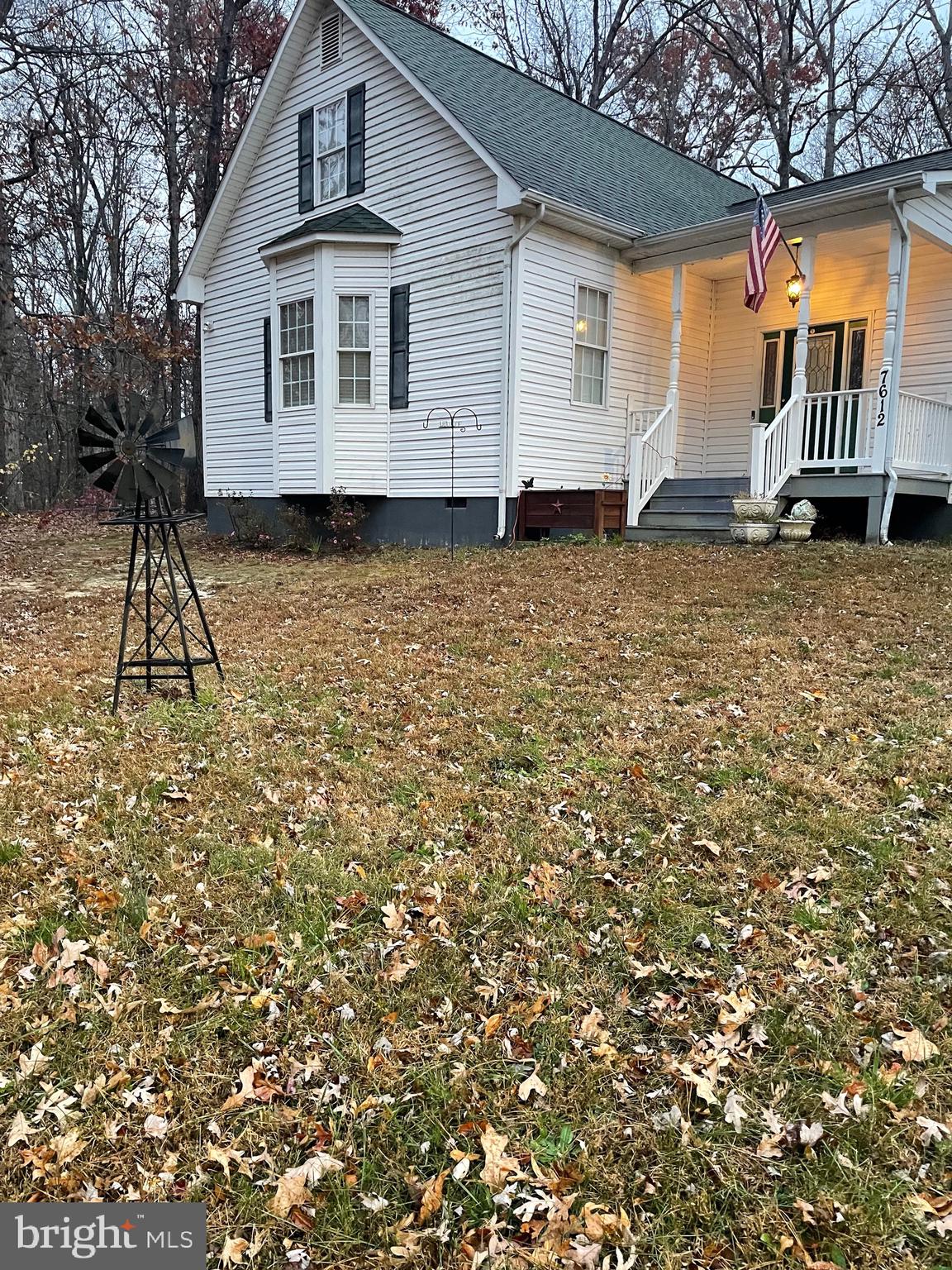 7612 Marye Road Spotsylvania, VA 22551 - Photo 17 of 39 a front view of a house with a yard