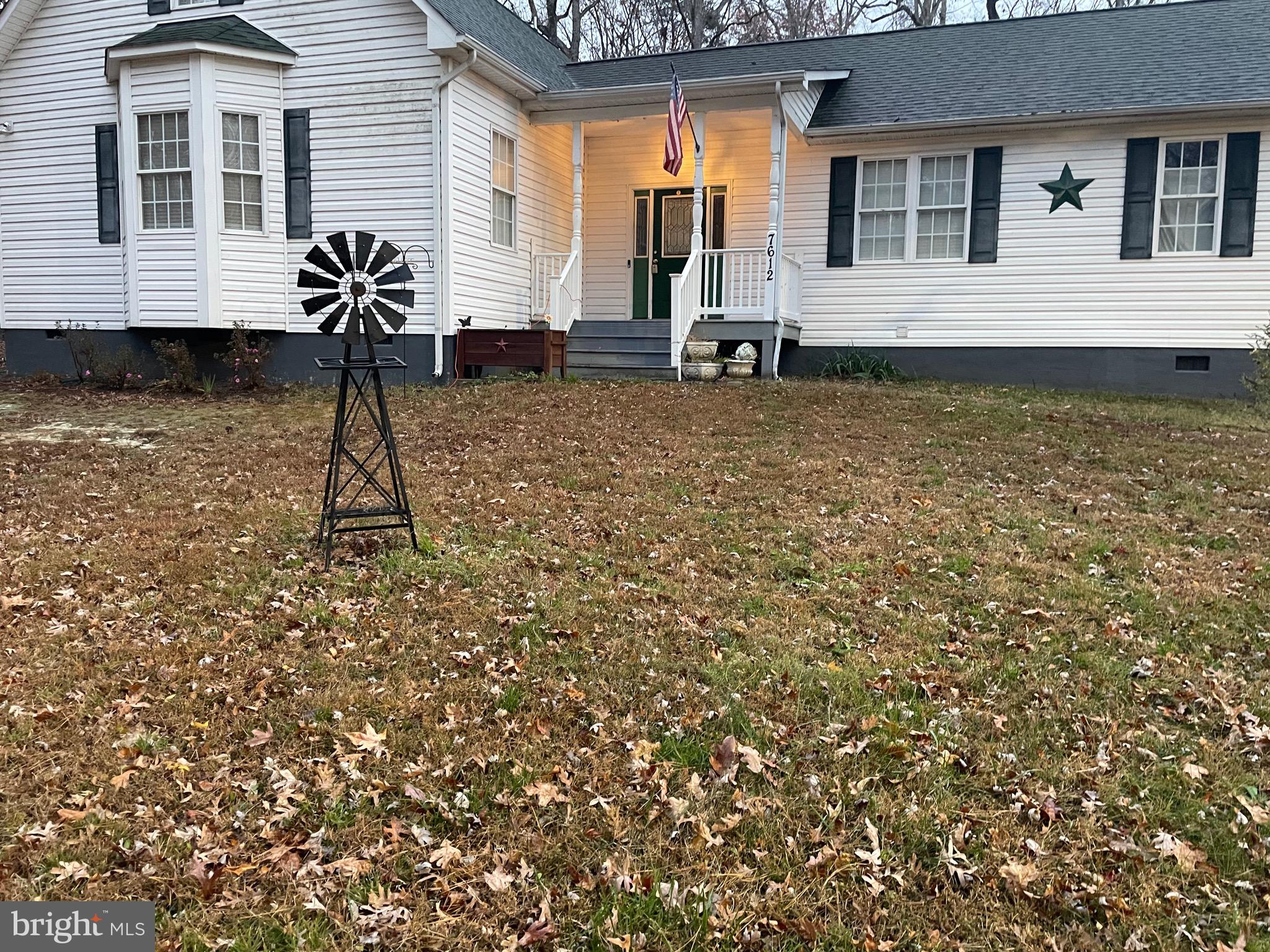 7612 Marye Road Spotsylvania, VA 22551 - Photo 18 of 39 a house view with a backyard space