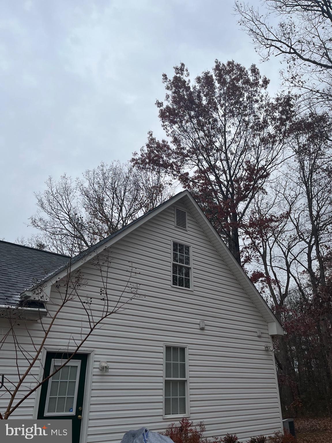 7612 Marye Road Spotsylvania, VA 22551 - Photo 19 of 39 a white house with a tree in the background