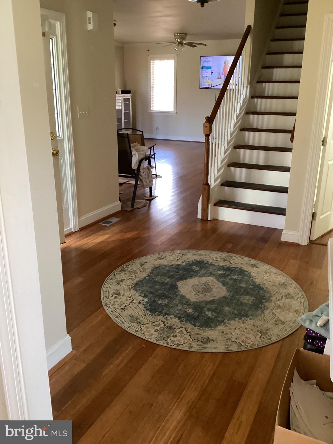 7612 Marye Road Spotsylvania, VA 22551 - Photo 2 of 39 a view of entryway and hall with wooden floor