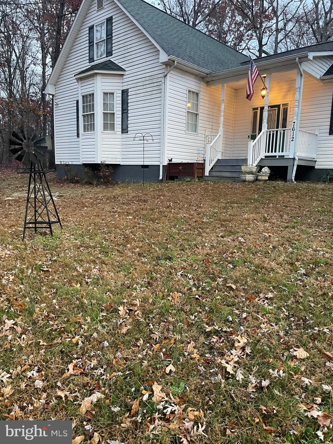 7612 Marye Road Spotsylvania, VA 22551 - Photo 21 of 39 a front view of a house with garden