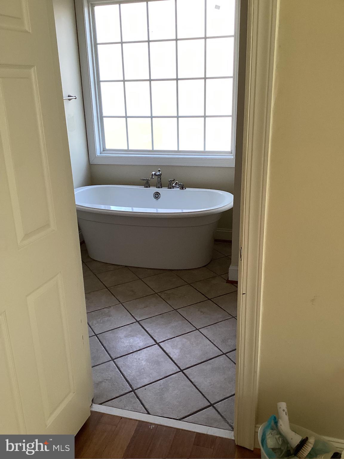 7612 Marye Road Spotsylvania, VA 22551 - Photo 23 of 39 a view of a bathtub in a bathroom