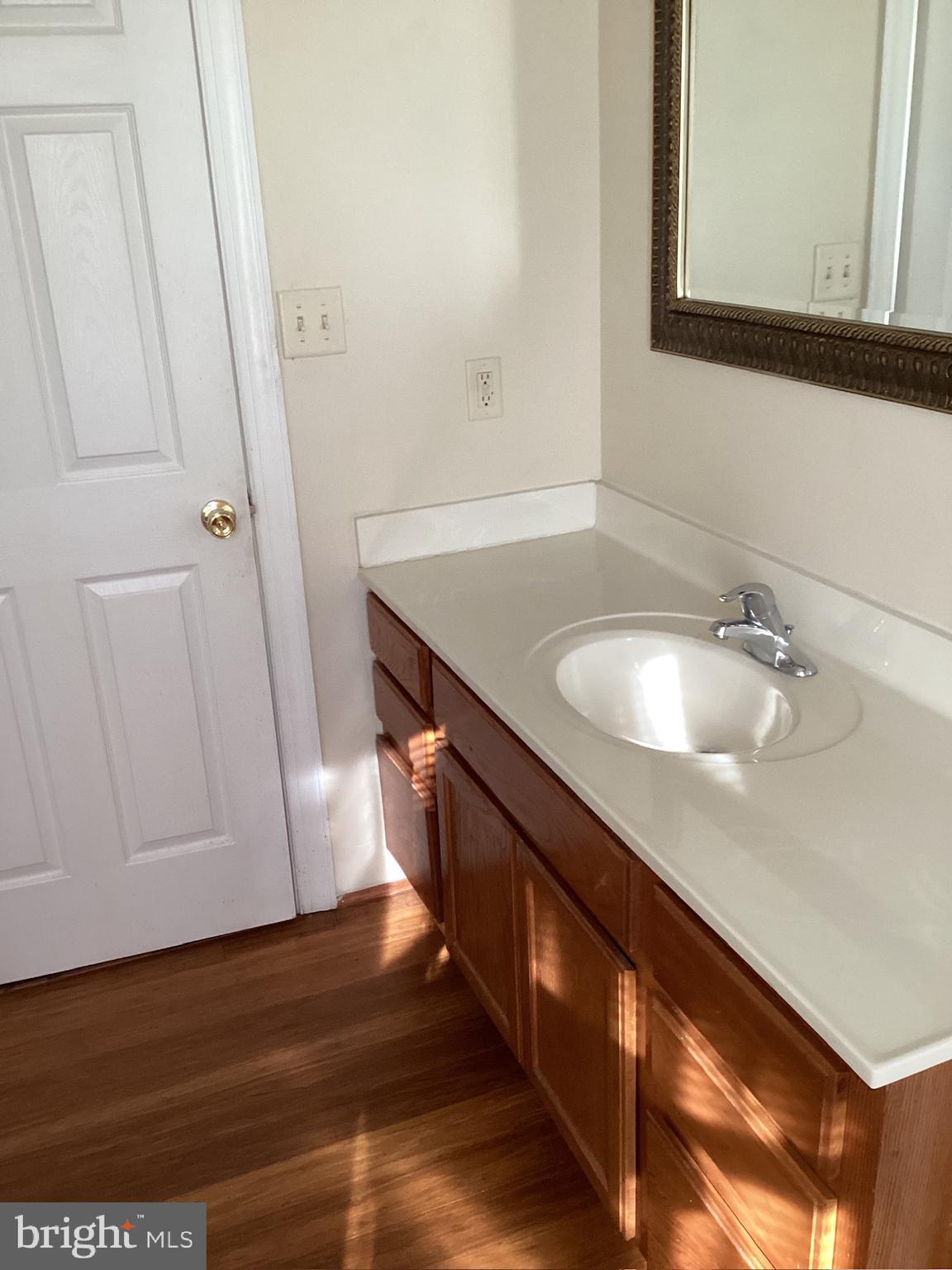 7612 Marye Road Spotsylvania, VA 22551 - Photo 31 of 39 a bathroom with a sink and a mirror