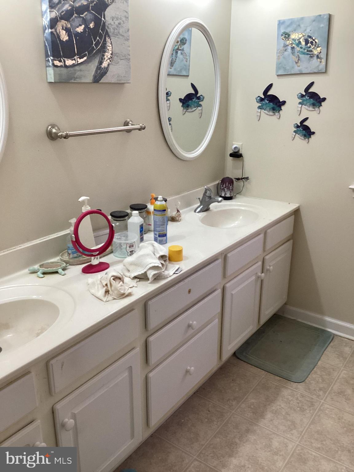 7612 Marye Road Spotsylvania, VA 22551 - Photo 7 of 39 a bathroom with a sink and a mirror
