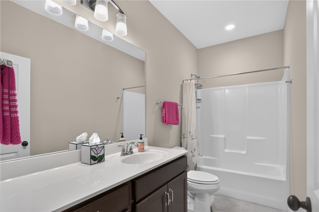 112 Tuttle Street Clemson, SC 29631 - Photo 22 of 46 A well-lit bathroom with a bright vanity and convenient tub-shower combination for daily routines.
