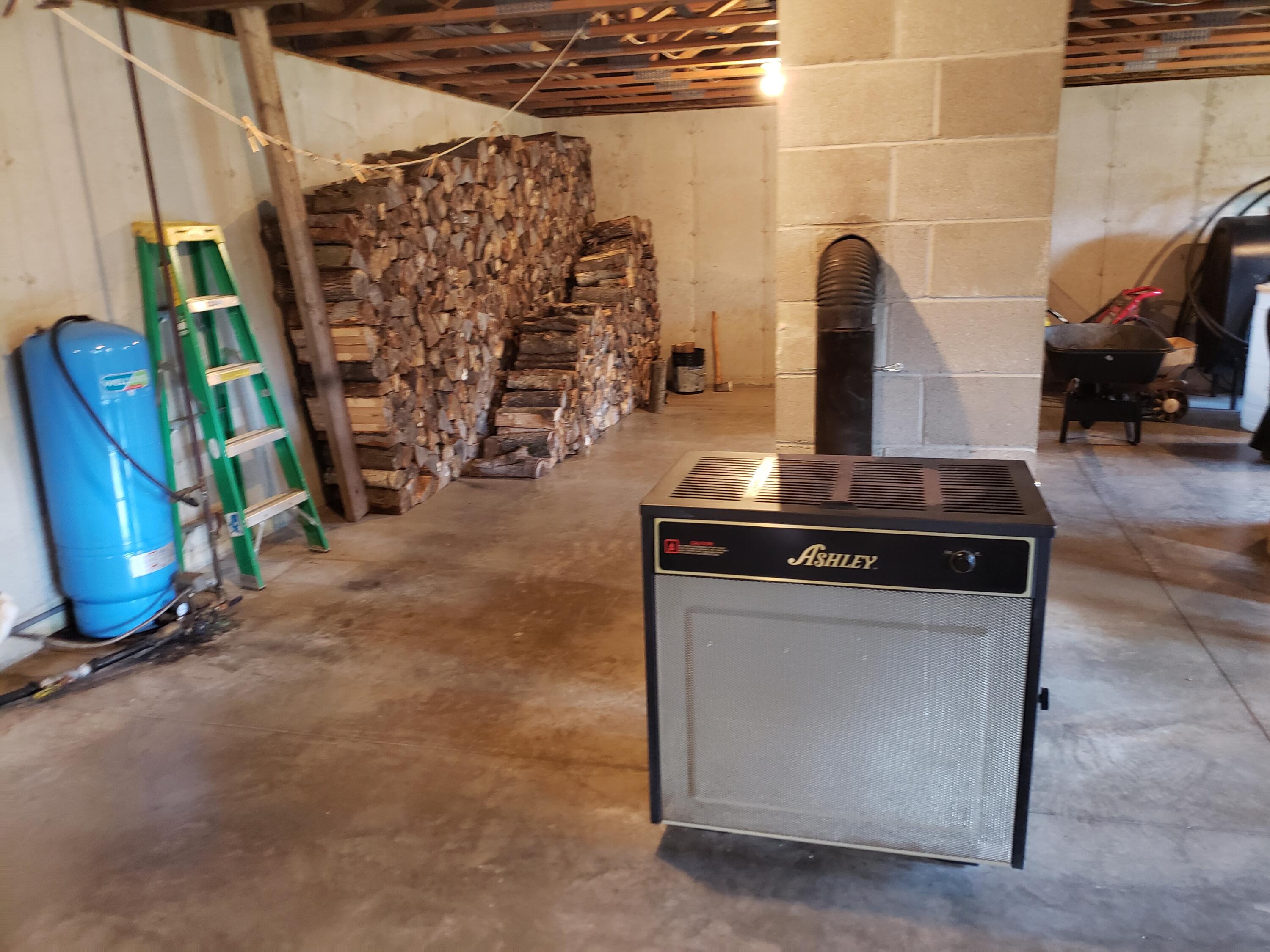 306 Gibbs Mill Road Livermore, ME 04253 - Photo 50 of 52 Full basement w/ woodstove.