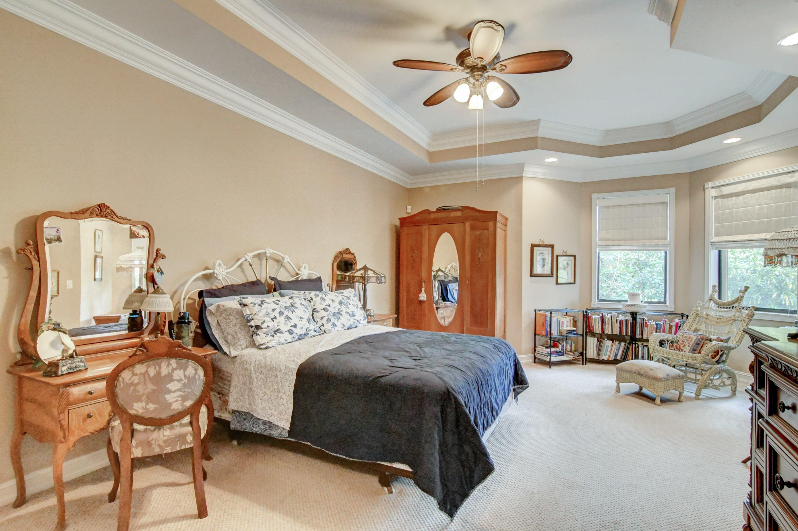 6863 Boscanni Drive Boynton Beach, FL 33437 - Photo 23 of 61 a bedroom with a bed couch and a large window
