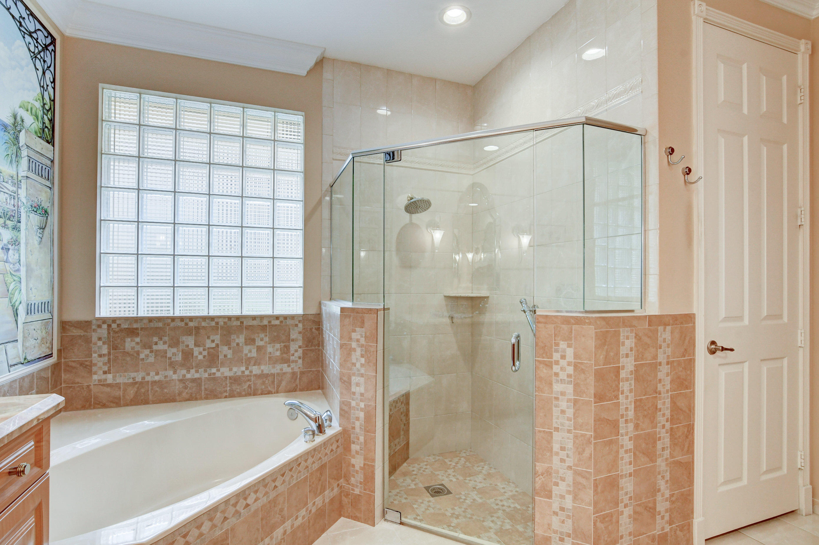 6863 Boscanni Drive Boynton Beach, FL 33437 - Photo 28 of 61 a bathroom with a bathtub and a shower