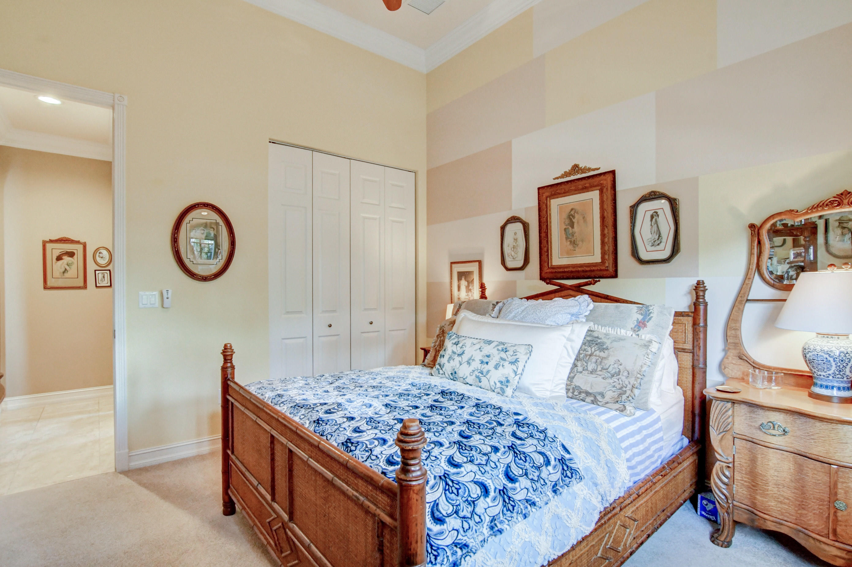 6863 Boscanni Drive Boynton Beach, FL 33437 - Photo 31 of 61 a bedroom with bed and a table