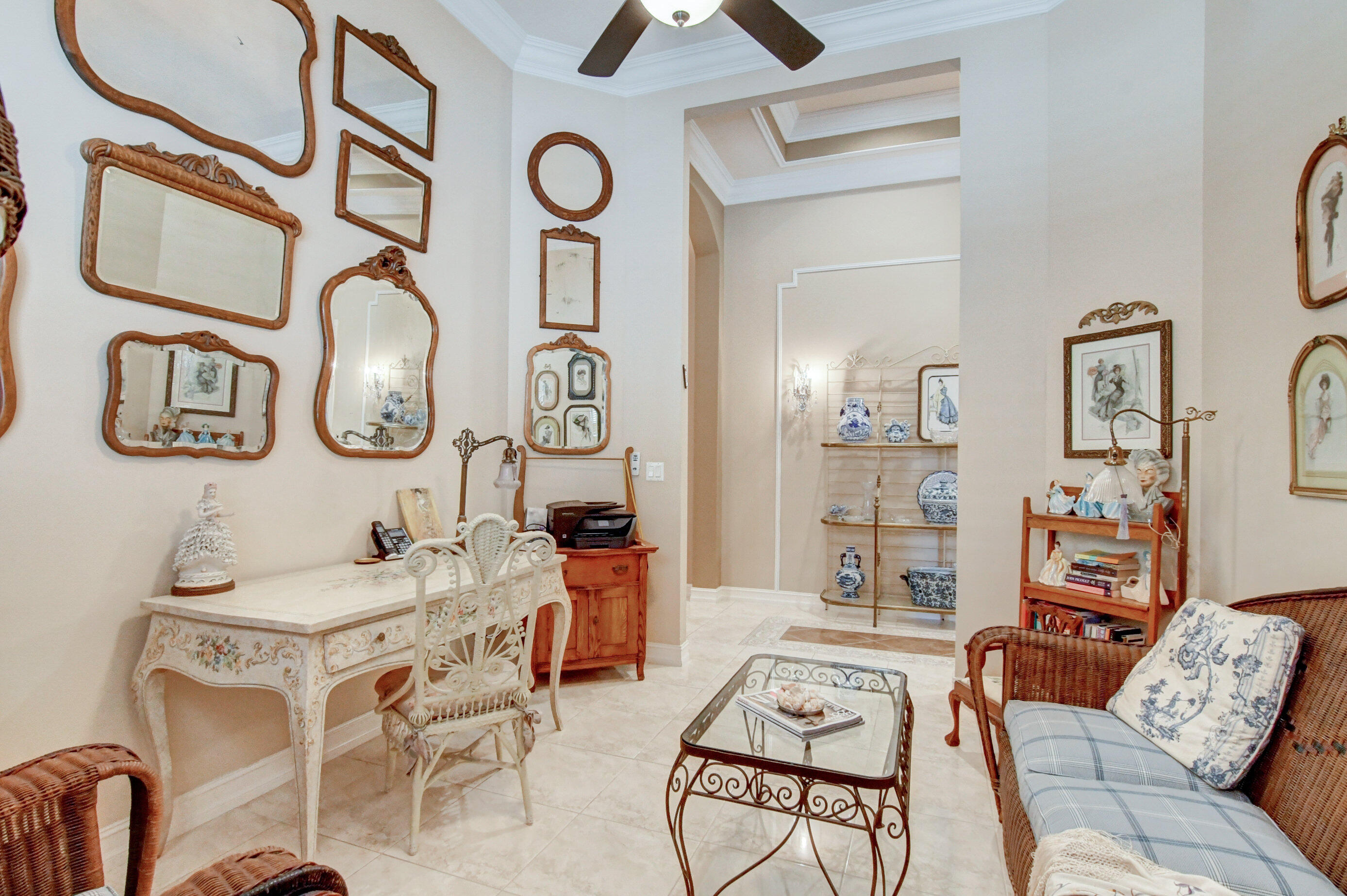 6863 Boscanni Drive Boynton Beach, FL 33437 - Photo 33 of 61 a living room with furniture and a clock