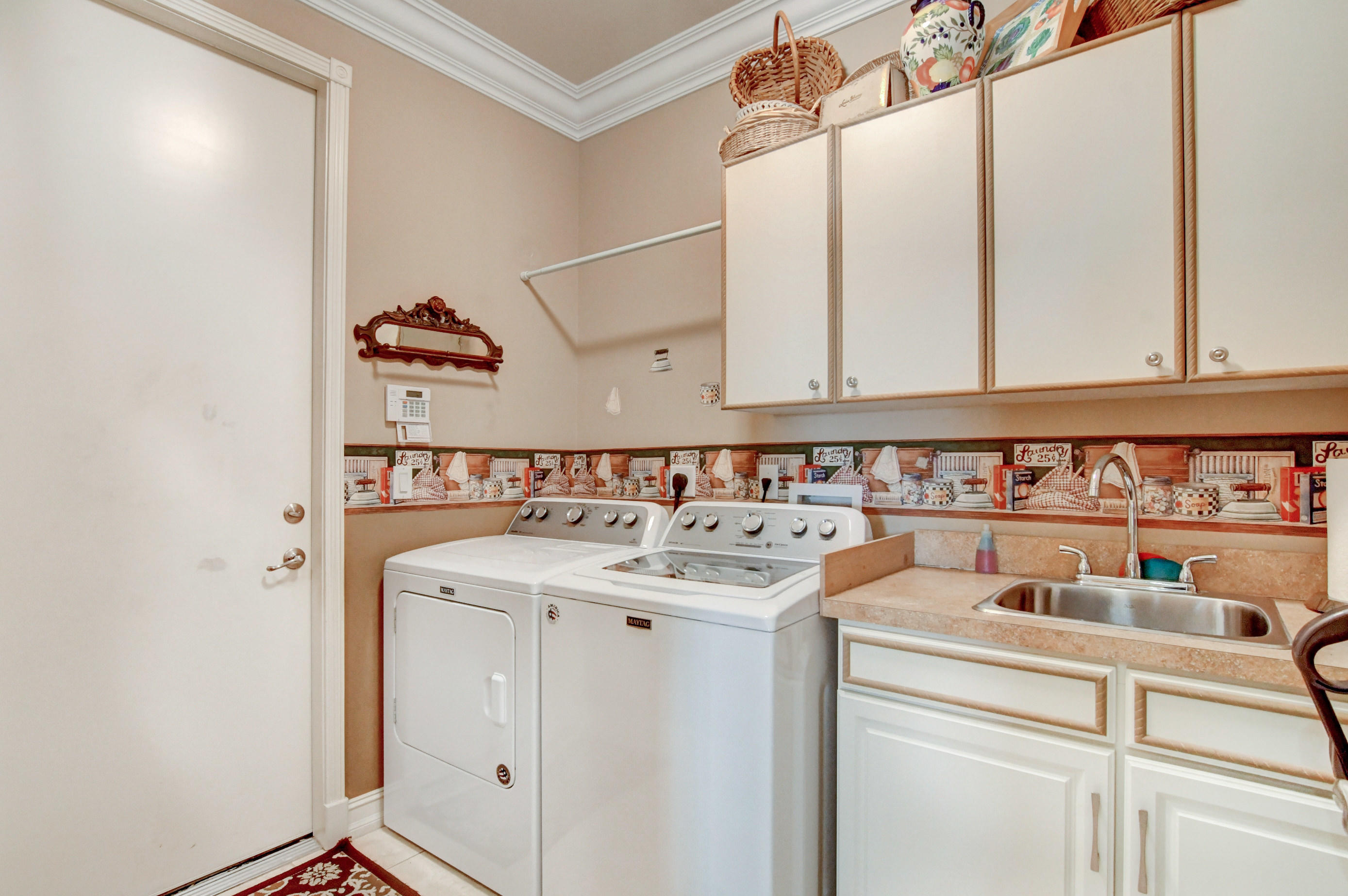 6863 Boscanni Drive Boynton Beach, FL 33437 - Photo 34 of 61 a utility room with dryer and washer