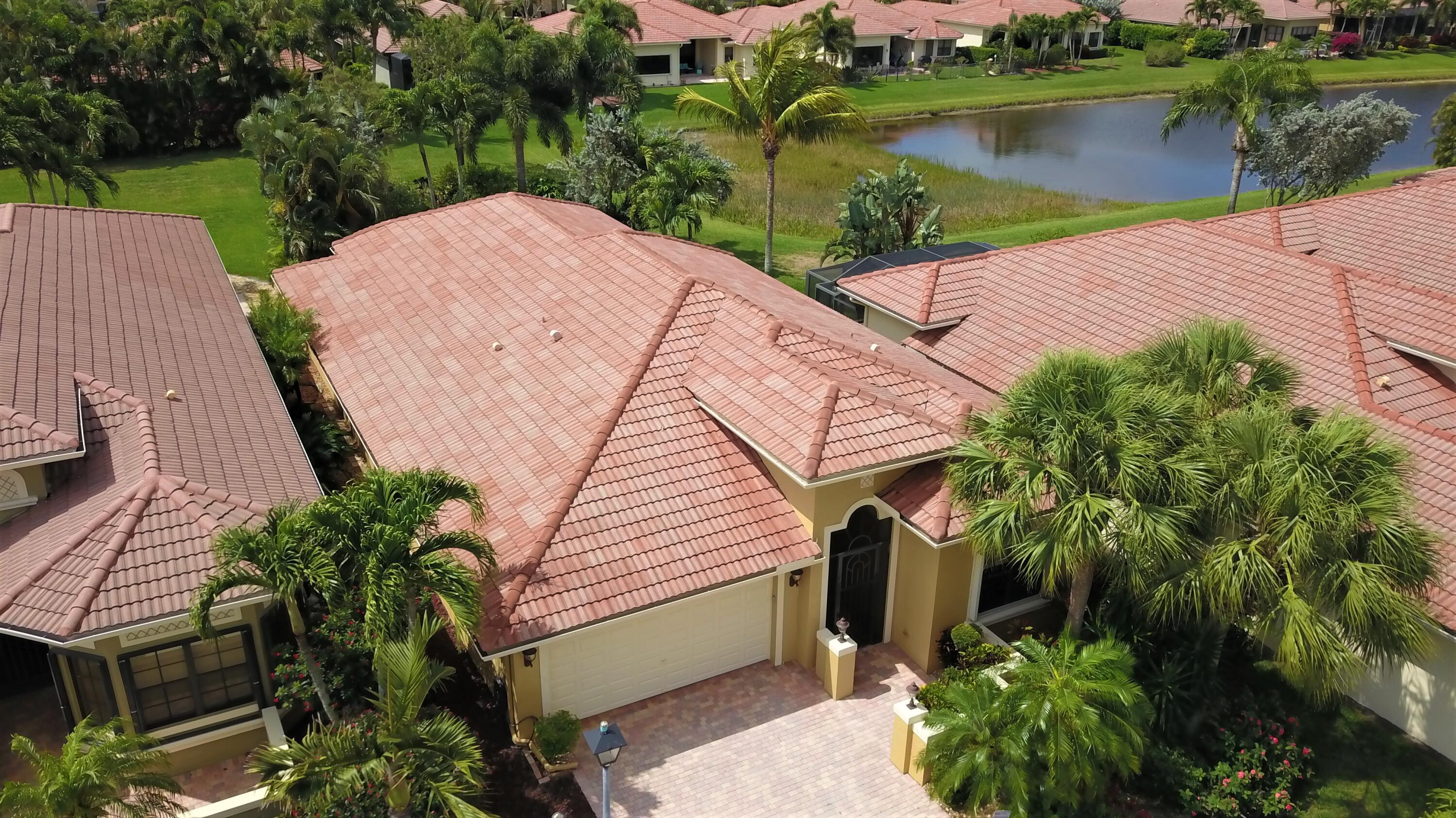 6863 Boscanni Drive Boynton Beach, FL 33437 - Photo 5 of 61 a view of a backyard with sitting area