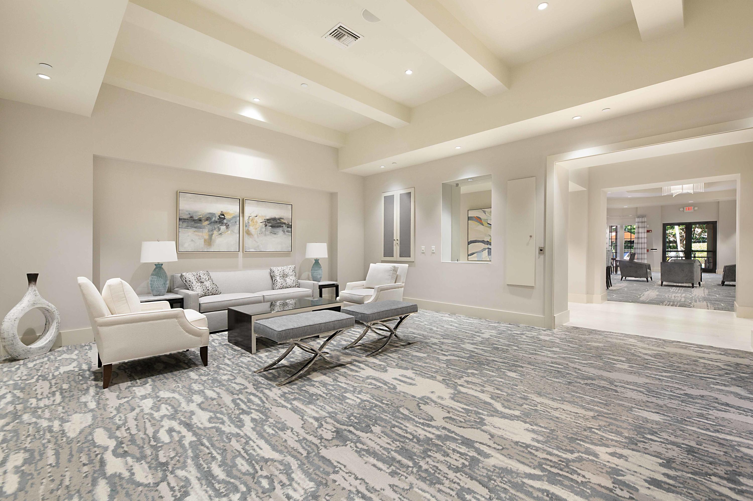 6863 Boscanni Drive Boynton Beach, FL 33437 - Photo 46 of 61 a living room with furniture and a large window