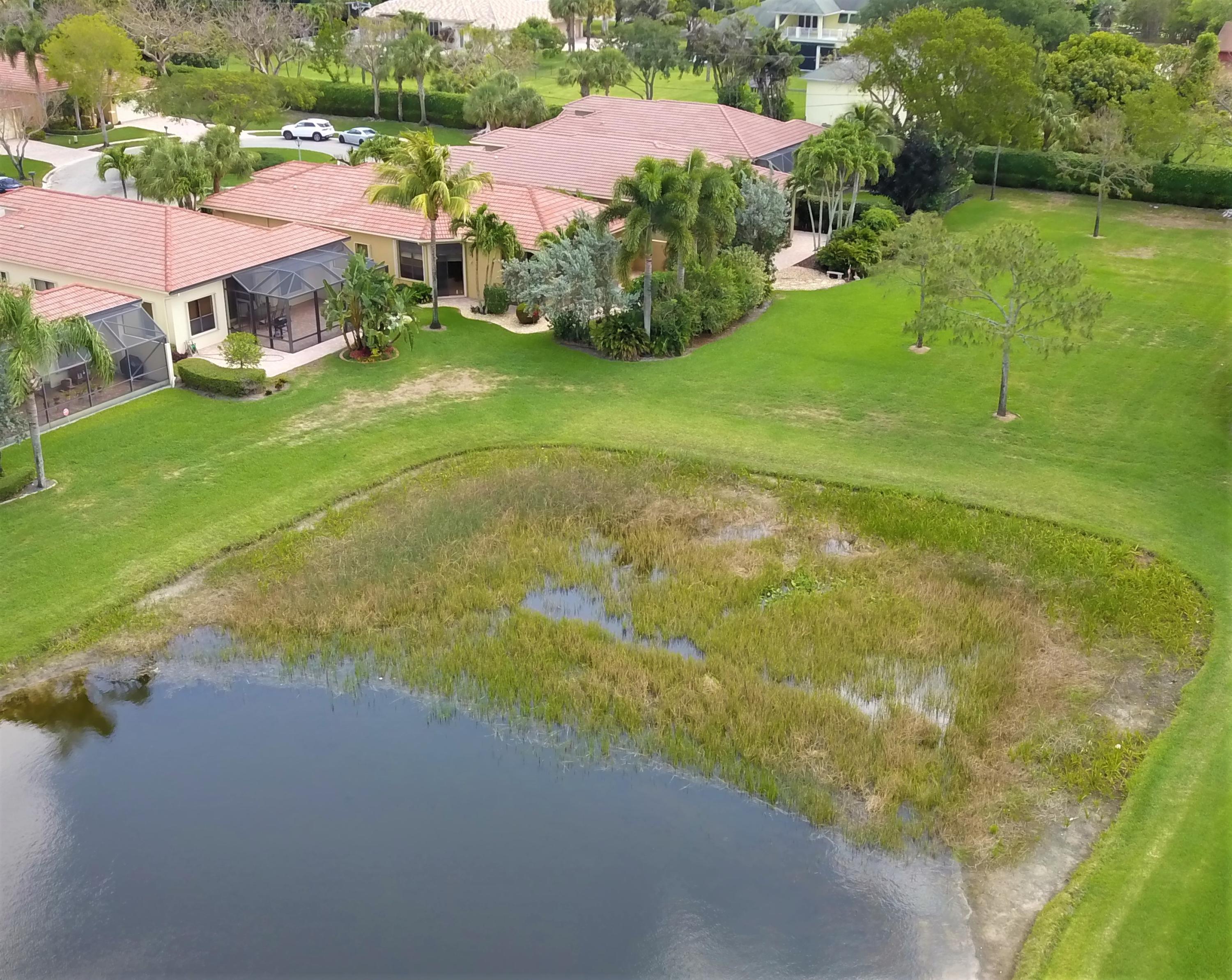 6863 Boscanni Drive Boynton Beach, FL 33437 - Photo 6 of 61 a view of a house with a yard