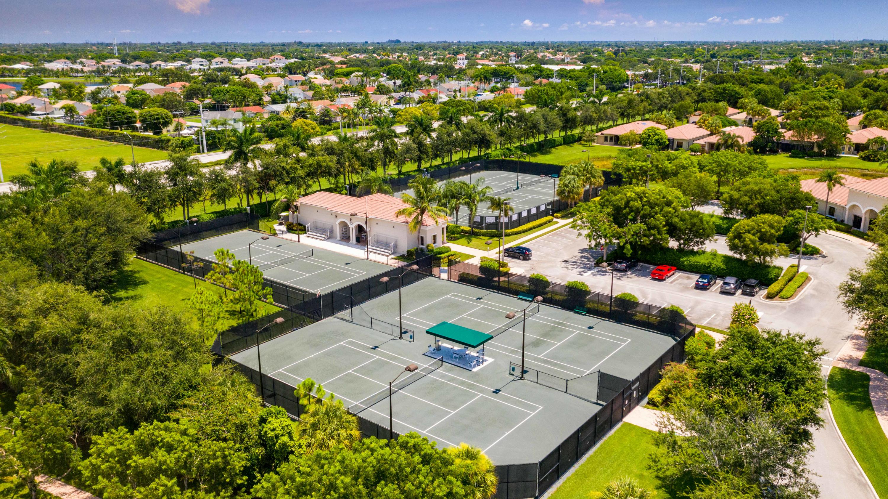 6863 Boscanni Drive Boynton Beach, FL 33437 - Photo 57 of 61 an aerial view of residential houses with outdoor space and river