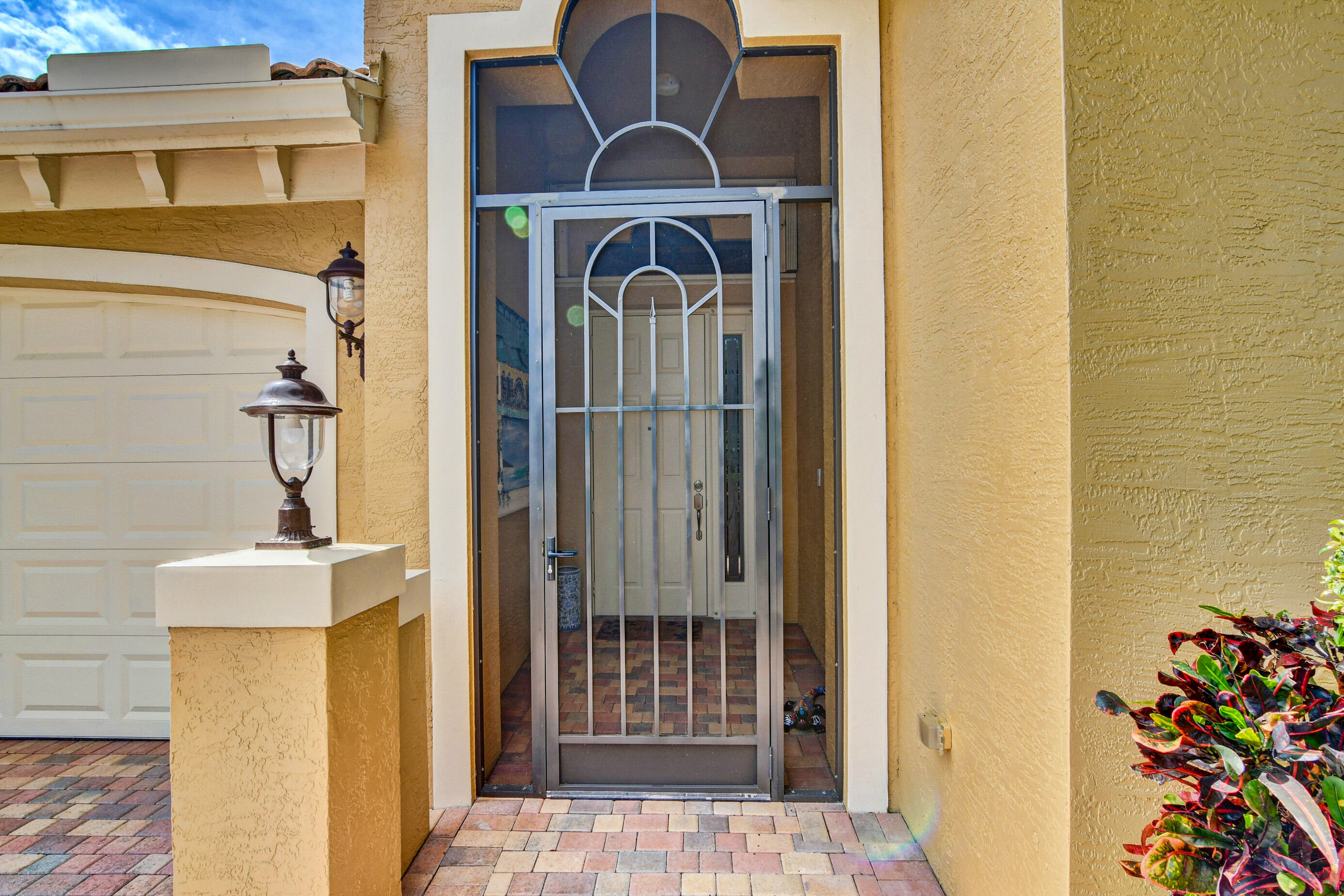 6863 Boscanni Drive Boynton Beach, FL 33437 - Photo 9 of 61 a view of front door of house