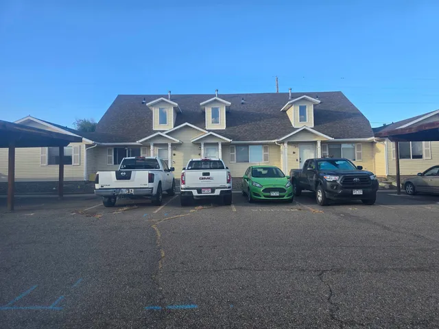 a car parked in front of a house