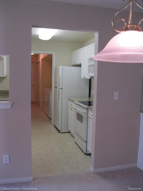 3384 Tremonte Circle, Unit 178 Rochester, MI 48306 - Photo 12 of 37 Thru DR to Kitchen & Laundry