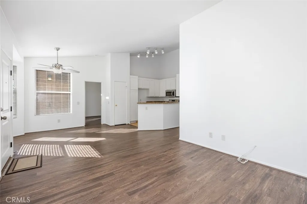 19431 Rue De Valore Lake Forest, CA 92610 - Photo 5 of 30 a view of a kitchen with wooden floor and a kitchen