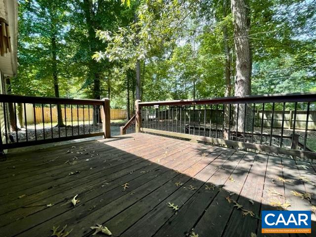 13 Riverside Drive Palmyra, VA 22963 - Photo 20 of 25 a view of balcony with wooden floor and fence