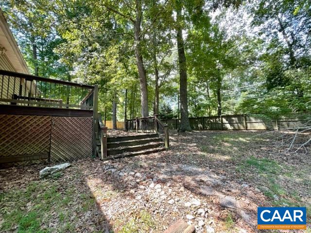 13 Riverside Drive Palmyra, VA 22963 - Photo 21 of 25 a view of a bench in a backyard