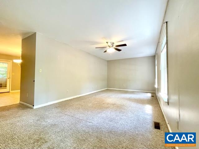 13 Riverside Drive Palmyra, VA 22963 - Photo 4 of 25 a view of an empty room with a chandelier