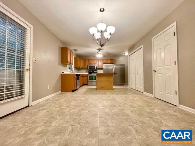 13 Riverside Drive Palmyra, VA 22963 - Photo 6 of 25 a view of a livingroom with a chandelier